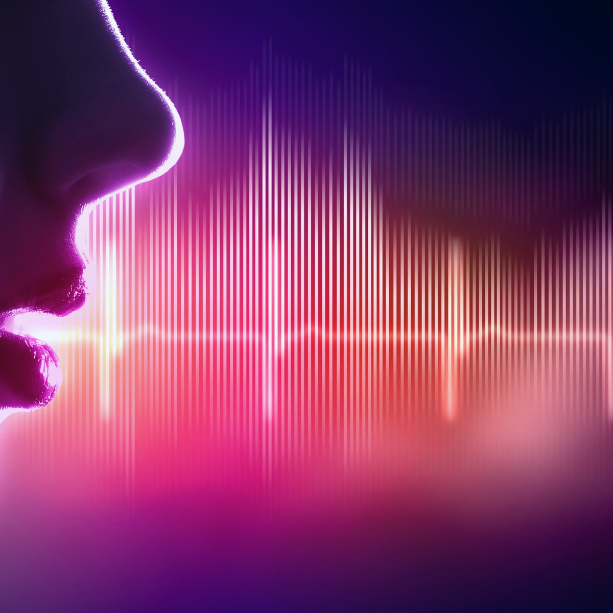Profile silhouette of a face with colorful digital sound waves emanating from the mouth. The audio waveform visualization features vertical bars in vibrant pink, purple, orange, and yellow hues against a deep purple-blue gradient background, representing voice or speech as visible sound frequencies.