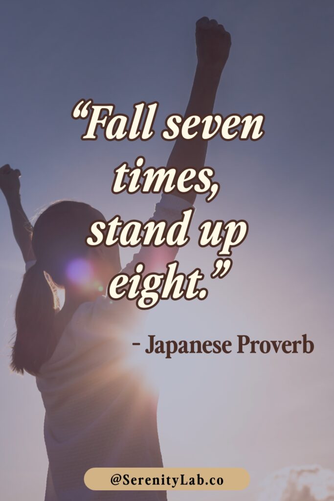 Silhouette of a woman with arms raised triumphantly against a bright sky with lens flare, featuring "Fall seven times, stand up eight." – Japanese Proverb.