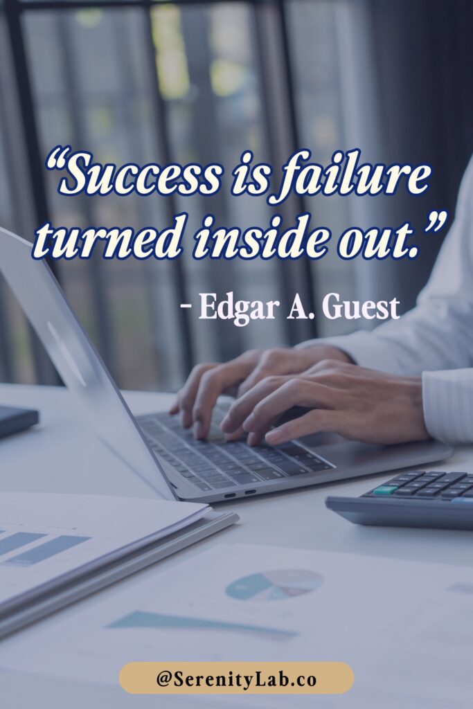 Hands typing on a laptop keyboard at an office desk with documents and calculator, displaying "Success is failure turned inside out." – Edgar A. Guest.